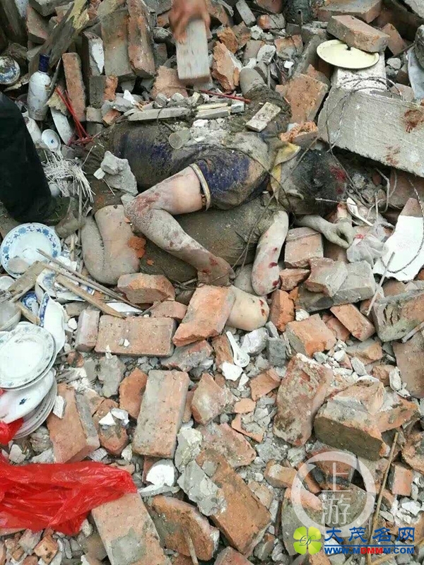 风灾中感动中国的男人：房屋倒下前用身体护住妻子(图)