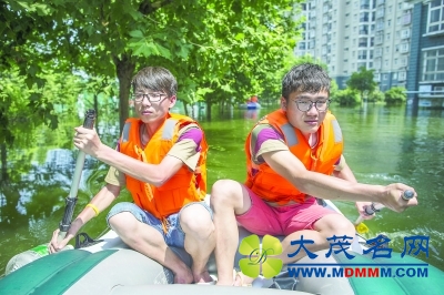 58名大学生坚守5天6夜 送出700名渍水围困居民(图)
